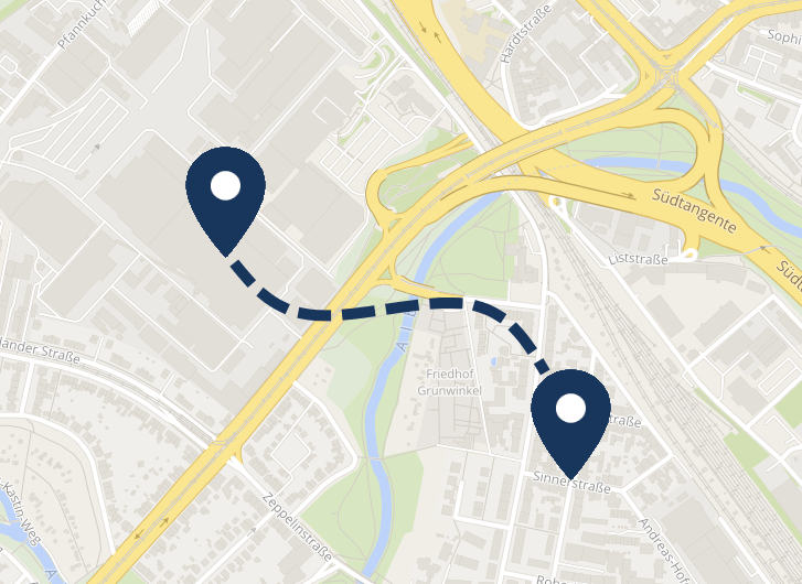SmartMaps Kartenausschnitt von Karlsruhe mit zwei markierten Standorten als Start- und Endpunkt. Eine gestrichelte Linie zeigt die Route zwischen ihnen.
