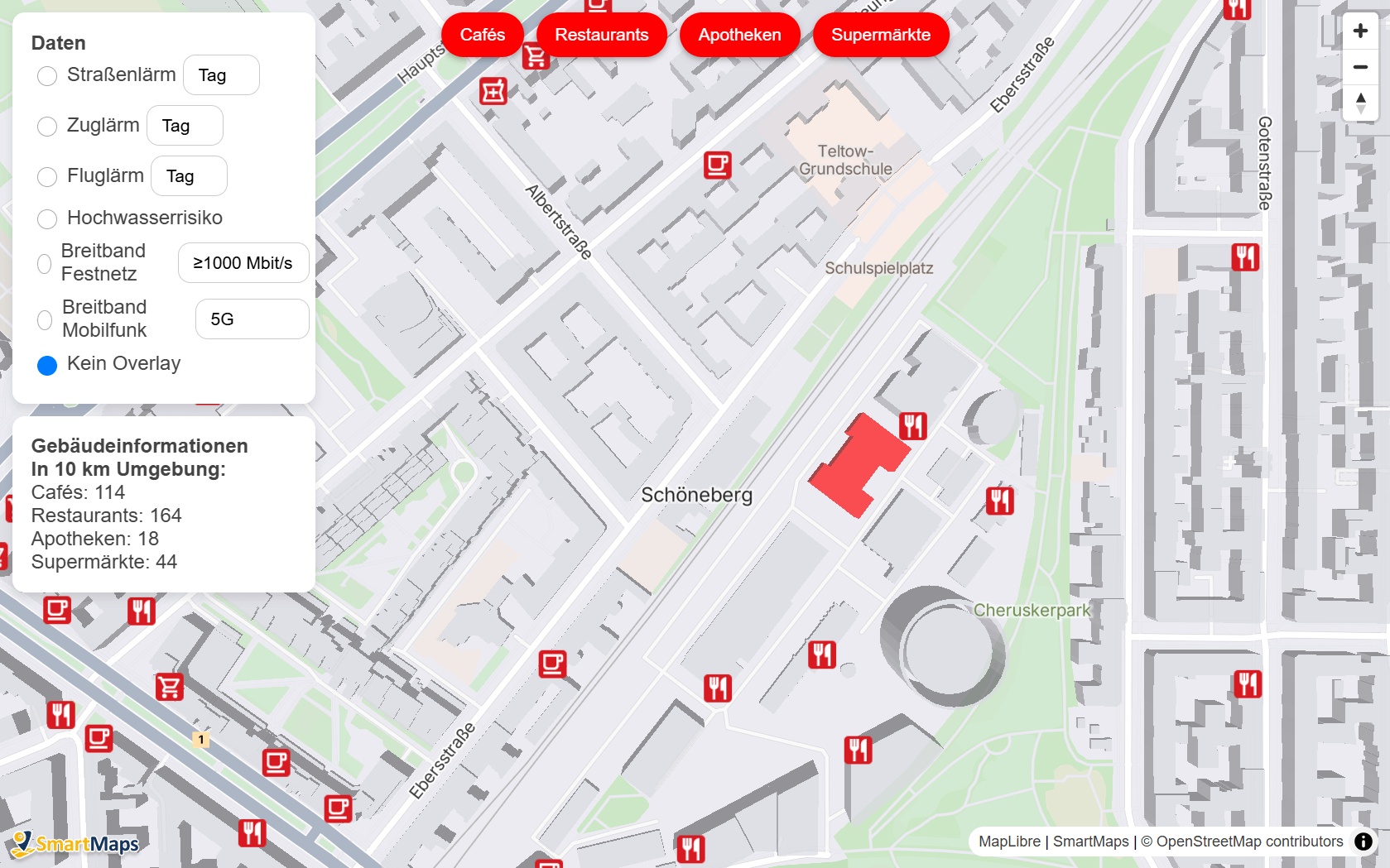Interaktive SmartMaps Karte des Berliner Stadtteils Schöneberg mit markierten Standorten verschiedener Einkaufsmöglichkeiten und Informationen zu einem ausgewählten Gebäude.